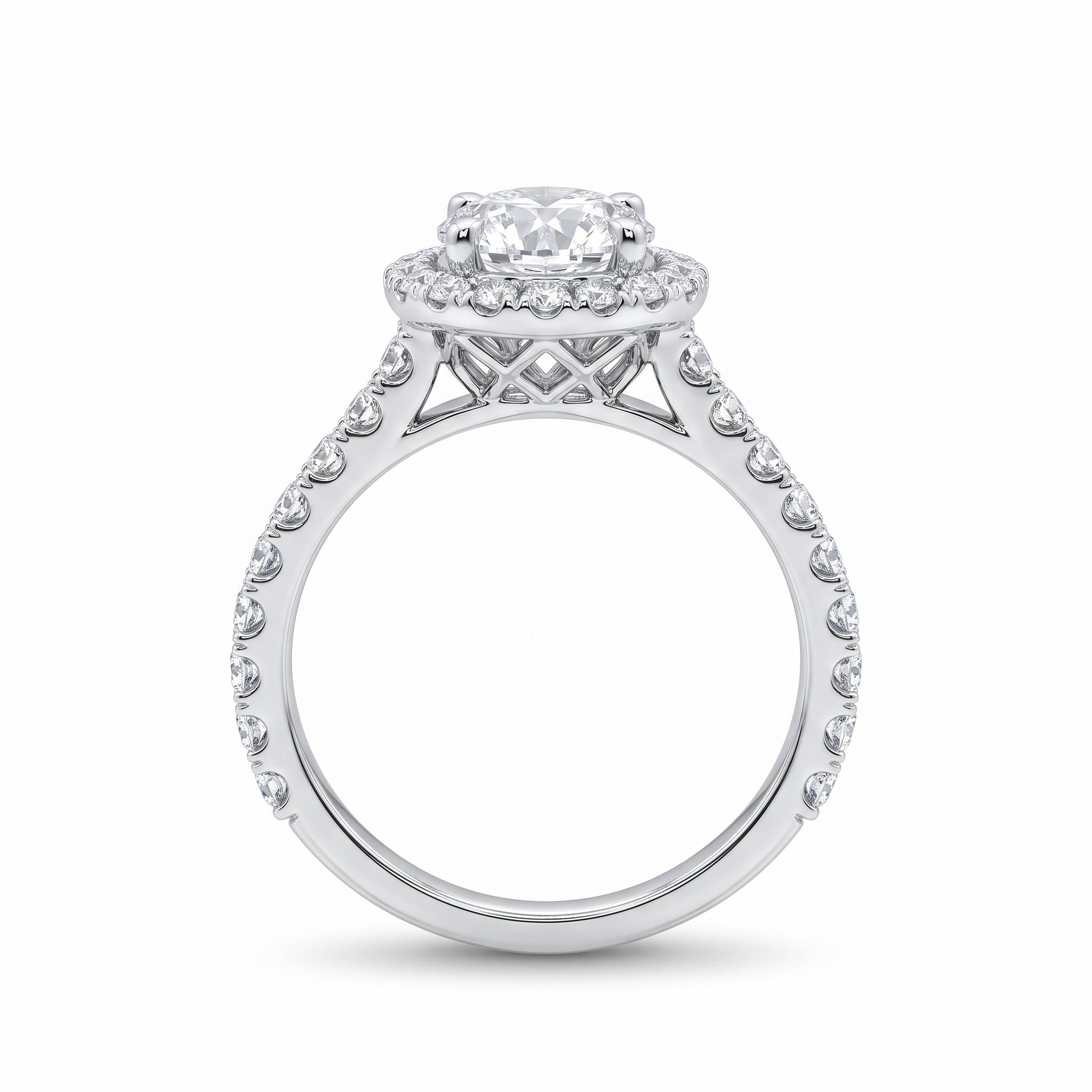 Detailed side profile of a diamond halo ring in white gold